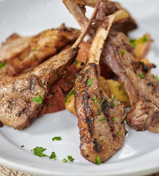 Acropolis Greek Taverna - Lamb Lollipops: Frenched Rack of Lamb All Natural Antibiotic-Free and No Added Hormones Cut into Chops Grilled to Perfection Over Greek Potatoes.