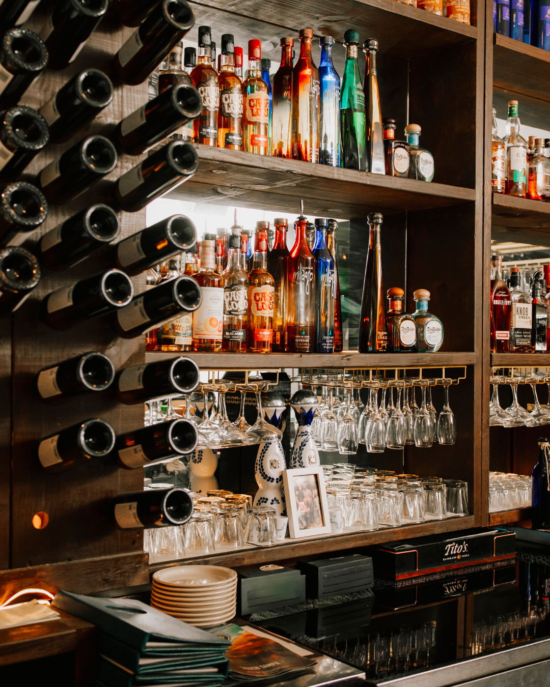 Full bar with wine rack and spirits at Acropolis Greek Taverna South Tampa Kennedy Blvd